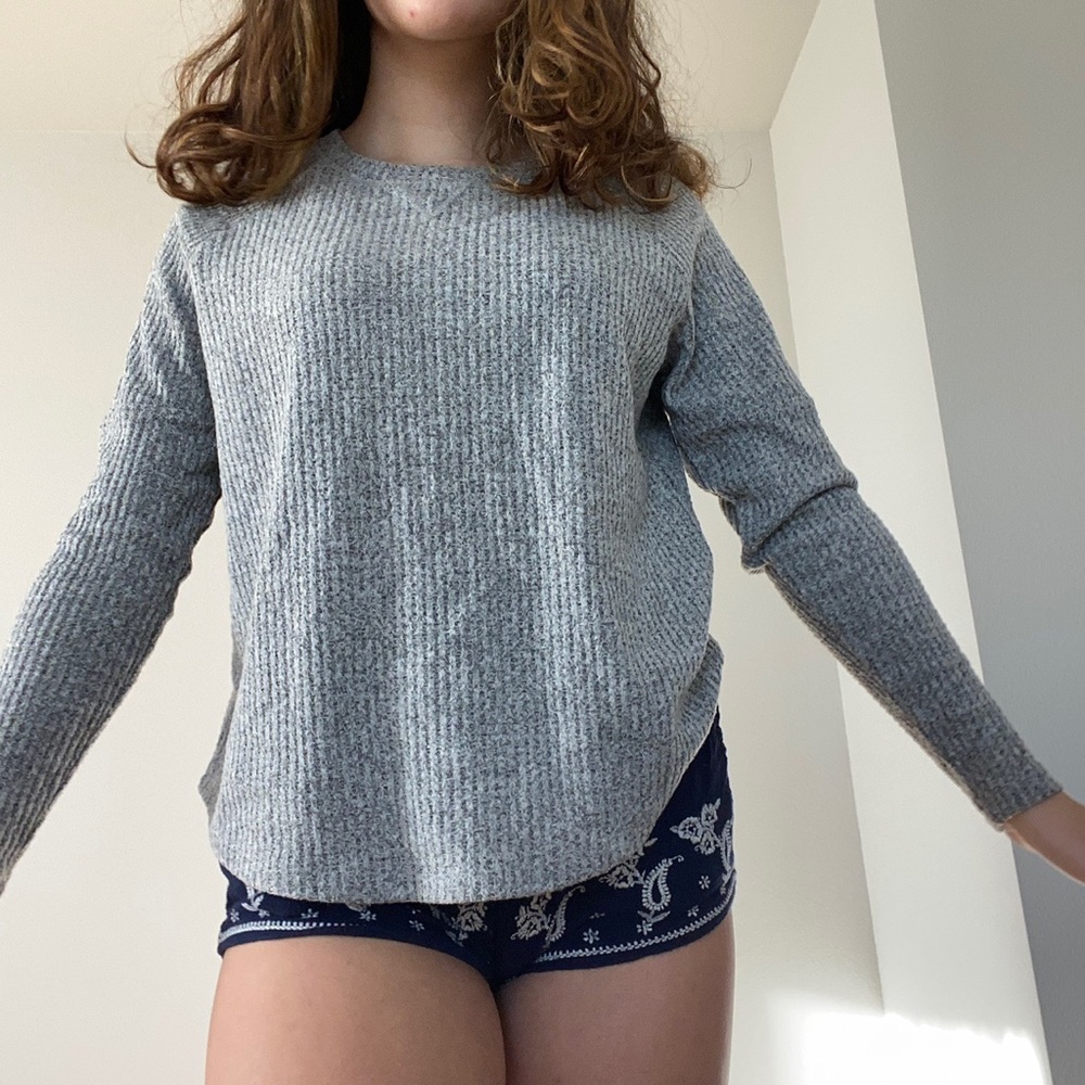 sweetest grey sweater by the brand sweet romeo